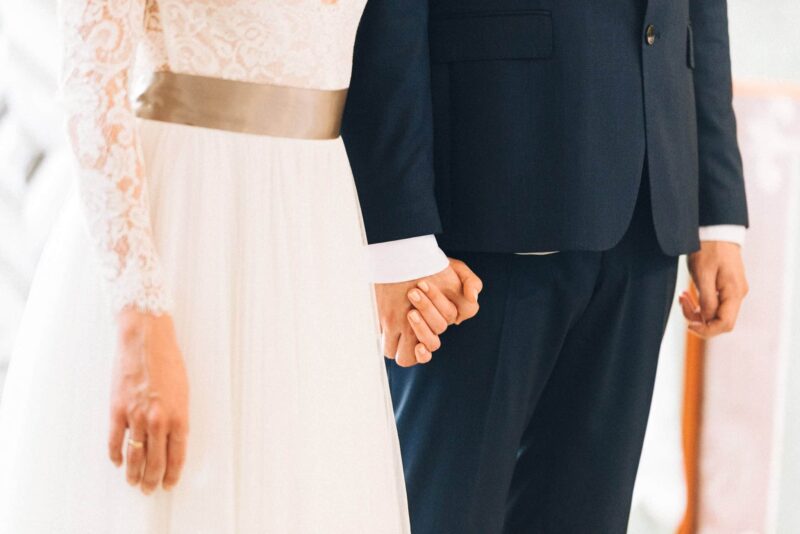 chapel-holding-hands