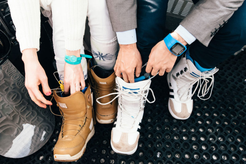 fastening snowboarding boots wedding