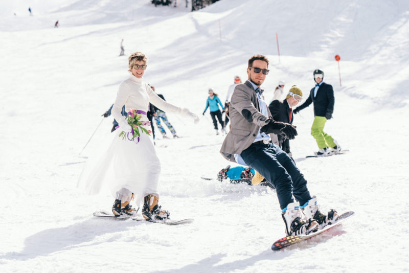 down the slopes bride dressed in white