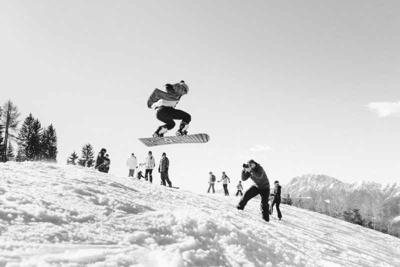groom airing with a snowboard